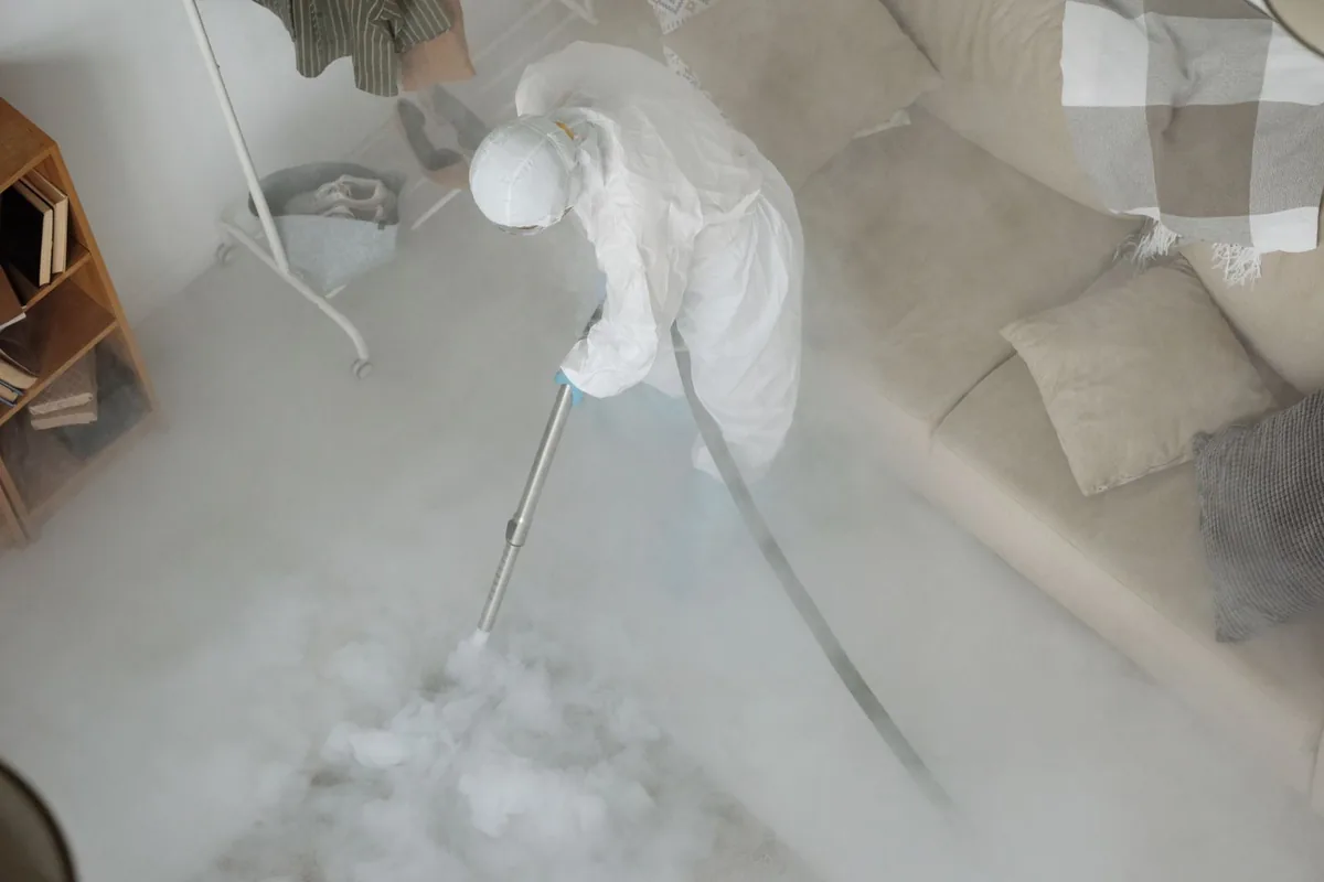 Biohazard cleanup technician in protective equipment, Riverdale, UT